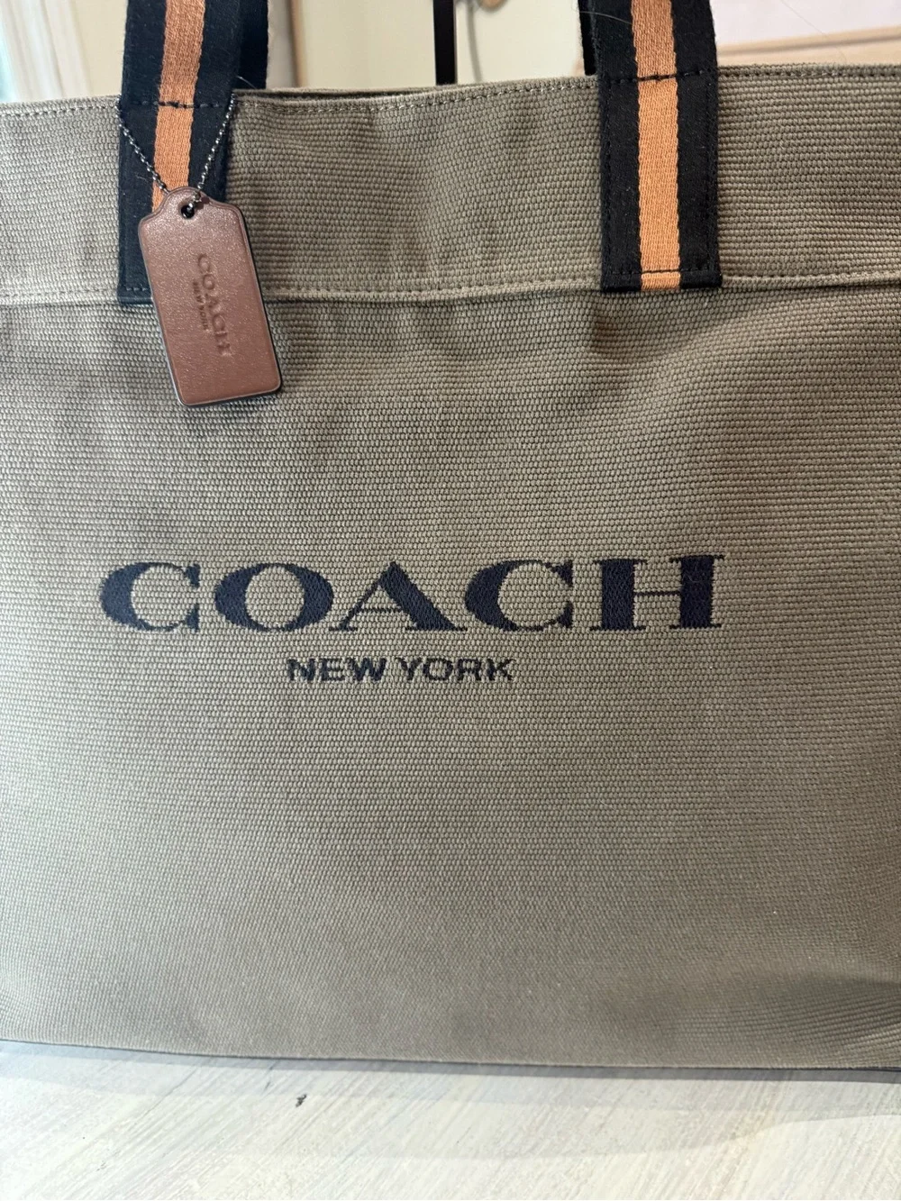 Coach Olive Canvas Tote with Black and Tan Handle Accents